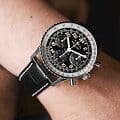 Breitling Breitling Navitimer B02 Chronograph 41 Cosmonaute PB02301A1B1P1, navitimer швейцария мужские часы на браслете кожаный боковой вид